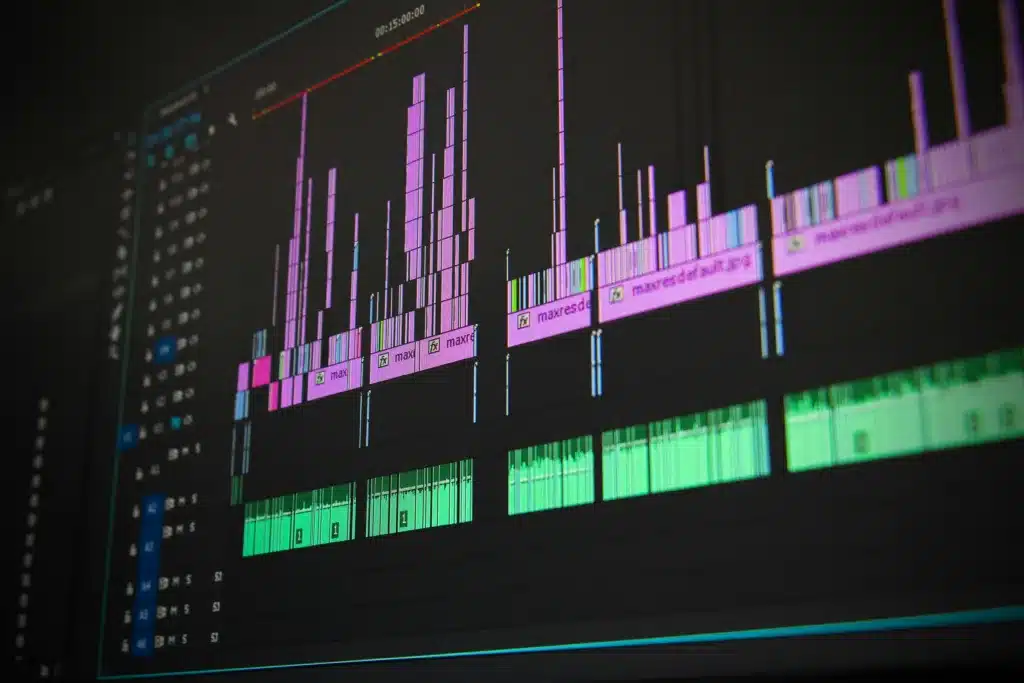Proven Strategies to Create Engaging Video Content for Social Media Like a Pro 4 Detailed view of a colorful video editing timeline on screen, highlighting the process of crafting engaging video content for social media growth