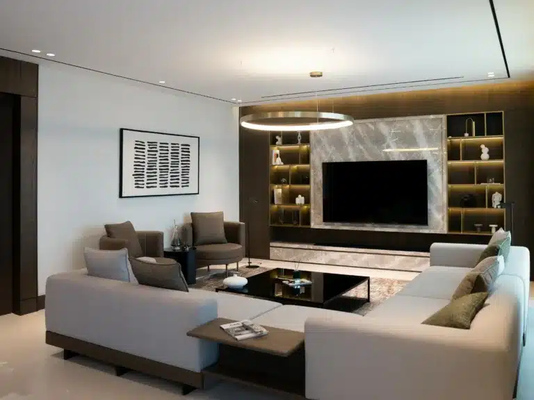 Revolutionize Your Business: The Ultimate 3D Visualization Guide for Furniture & Marketing 5 3D visualization of a modern luxury living room interior design featuring a marble TV wall, built-in shelves with ambient lighting, contemporary sofas, and minimalist décor